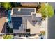 Aerial perspective of the property, highlighting the roof, solar panels, pool, and surrounding landscaping at 3079 Paseo Mountain Ave, Henderson, NV 89052