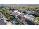 Bird's eye view of a residential area with well-spaced houses, mature trees, and clear blue skies at 3079 Paseo Mountain Ave, Henderson, NV 89052