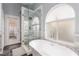 Luxurious bathroom with soaking tub, glass shower, and elegant finishes at 3079 Paseo Mountain Ave, Henderson, NV 89052