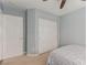 Bright bedroom showcases neutral paint and a closet with sliding doors at 3079 Paseo Mountain Ave, Henderson, NV 89052