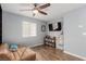 This comfortable bedroom offers a sofa, ceiling fan and convenient storage options at 3079 Paseo Mountain Ave, Henderson, NV 89052