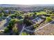 Aerial view of park with tennis and basketball courts, playground, and desert landscape at 3079 Paseo Mountain Ave, Henderson, NV 89052