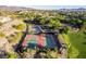 Park featuring tennis and basketball courts, lush trees, and walking paths in residential area at 3079 Paseo Mountain Ave, Henderson, NV 89052