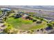 Aerial view of community park featuring a baseball field, with desert landscape in the background at 3079 Paseo Mountain Ave, Henderson, NV 89052