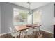 Sunlit dining area with large windows overlooking the outdoor space and natural light at 3079 Paseo Mountain Ave, Henderson, NV 89052