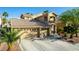 Attractive home features a three-car garage, well-kept landscaping, and a welcoming facade at 3079 Paseo Mountain Ave, Henderson, NV 89052