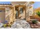 Charming front porch with seating area and manicured landscaping at 3079 Paseo Mountain Ave, Henderson, NV 89052