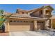 Home exterior highlighting the spacious three-car garage, enhancing functionality and convenience at 3079 Paseo Mountain Ave, Henderson, NV 89052