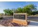 A Vivaldi Park sign surrounded by rocks and green landscaping under a blue sky at 3079 Paseo Mountain Ave, Henderson, NV 89052