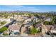 Neighborhood street view showcasing well-maintained homes with desert landscaping and mountain views at 3079 Paseo Mountain Ave, Henderson, NV 89052