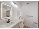 Bright bathroom featuring double sinks with modern faucets, and LED-lit mirrors at 3104 Waterview Dr, Las Vegas, NV 89117
