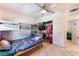 bedroom featuring tile floors, a bunk bed, a closet, and access to another room at 3112 Twining Ave, North Las Vegas, NV 89030