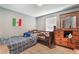 Cozy bedroom with wood floors, twin bed, and chest of drawers at 3112 Twining Ave, North Las Vegas, NV 89030