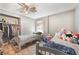Shared bedroom featuring hard wood floors, two single beds, and lots of storage at 3112 Twining Ave, North Las Vegas, NV 89030