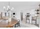 Open concept home with dining room open to the kitchen and living room at 325 Heather Dr, Henderson, NV 89002