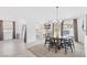 Open concept home with dining room open to the kitchen and living room at 325 Heather Dr, Henderson, NV 89002