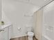 Well-lit bathroom featuring a shower/tub combo and light wood flooring at 3762 Sonrisa Vista Ave, Henderson, NV 89044