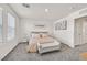 Carpeted main bedroom features a large window and neutral decor at 3762 Sonrisa Vista Ave, Henderson, NV 89044