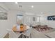 Open-concept dining area with modern furnishings, great natural light, and warm, neutral design elements at 3762 Sonrisa Vista Ave, Henderson, NV 89044