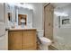 Renovated bathroom featuring a glass-enclosed shower with custom tile, and a modern vanity at 4004 Nancy Margarite Ln, Las Vegas, NV 89130