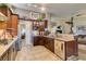Well-lit kitchen with stainless steel appliances, granite countertops, and custom wood cabinetry at 4004 Nancy Margarite Ln, Las Vegas, NV 89130