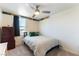 Nicely decorated room, featuring a bed, ceiling fan and Minecraft border at 4517 Swimming Minnow Ave, Las Vegas, NV 89141