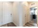 Bright entryway features wood flooring, a front door, and access to living spaces at 4517 Swimming Minnow Ave, Las Vegas, NV 89141