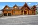 Stunning log cabin home with attached garage, offering rustic charm and modern convenience at 4927 Snow White Rd, Las Vegas, NV 89124
