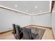 A bright media room with reclining chairs on a patterned area rug at 4927 Snow White Rd, Las Vegas, NV 89124
