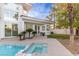 Private backyard retreat with a stunning pool, patio area, and lush surroundings at 4944 Spanish Heights Dr, Las Vegas, NV 89148