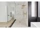 Expansive walk-in shower with marble surround and dual shower heads at 4944 Spanish Heights Dr, Las Vegas, NV 89148