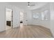 Bedroom featuring neutral colors, wood floors, and natural lighting at 4944 Spanish Heights Dr, Las Vegas, NV 89148