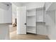 Walk-in closet with custom shelving and storage solutions, perfect for organization at 4944 Spanish Heights Dr, Las Vegas, NV 89148