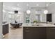 Well-designed kitchen boasting granite countertops, modern fixtures, and an adjacent breakfast nook at 4944 Spanish Heights Dr, Las Vegas, NV 89148