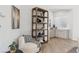 Cozy chair with shelving nook, storage cabinets, and a large window for natural light at 4944 Spanish Heights Dr, Las Vegas, NV 89148