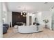 Elegant living room with a fireplace, stylish furniture, and an open layout at 4944 Spanish Heights Dr, Las Vegas, NV 89148