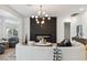 Cozy living room with a fireplace, stylish furniture, and bright, neutral decor at 4944 Spanish Heights Dr, Las Vegas, NV 89148
