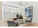 Cozy office space with stylish decor, comfortable seating, and natural light at 4944 Spanish Heights Dr, Las Vegas, NV 89148
