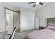 Bedroom with work desk, closet, and bed at 5045 Sock Hop Way, North Las Vegas, NV 89031