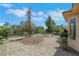 The backyard provides ample space with desert landscaping at 5078 Rivedro St, Las Vegas, NV 89135