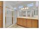 Bathroom boasts double sinks, a shower and bright natural light at 5078 Rivedro St, Las Vegas, NV 89135