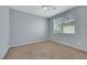 Serene bedroom with neutral paint and a large window at 5078 Rivedro St, Las Vegas, NV 89135