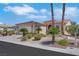 Charming single-story home features desert landscaping, an attached two-car garage, and a tiled roof at 5078 Rivedro St, Las Vegas, NV 89135