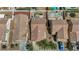 Aerial shot of the property showing the roof, patio with pergola, and surrounding neighborhood at 520 Blackbird Knoll Ct, North Las Vegas, NV 89084