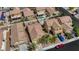 Aerial view of the home showcasing the backyard, patio, and the layout of the neighborhood at 520 Blackbird Knoll Ct, North Las Vegas, NV 89084