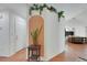 Bright entryway featuring stylish decor, a decorative partition with plants, and easy access to the living area at 520 Blackbird Knoll Ct, North Las Vegas, NV 89084