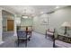 Comfortable hallway seating area with soft lighting, perfect for relaxing and socializing with neighbors at 555 Highland Dr # 203, Mesquite, NV 89027