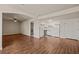 Open living space with a kitchen, hardwood floors and white walls at 555 Highland Dr # 203, Mesquite, NV 89027