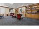 A lounge area showcasing built-in bookshelves, a fireplace, and comfortable seating at 555 Highland Dr # 203, Mesquite, NV 89027