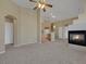 Large living room with new carpet and kitchen access is great for entertaining at 5553 High Wager Way # 101, Las Vegas, NV 89122
